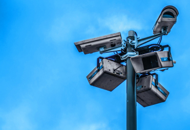 Surveillance-cameras-blue-sky-photo